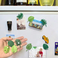 Set of 12 mini tropical leaf fridge magnets from Everything Baby, featuring cute small plant designs for kitchen or office decor