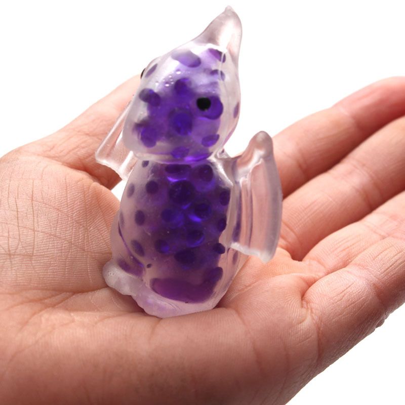 Colorful 12-piece dinosaur pinch toy set for kids, featuring smooth edges and clear textures to help relieve stress and promote tactile play.