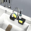 Two silicone faucet splash guard mats with dish sponge holder, used to catch water and protect sink surfaces, in a baby and kids' nursing area.