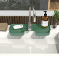 Two silicone faucet splash guard mats with dish sponge holders, designed to catch water and keep sinks dry.