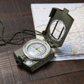 Waterproof military sighting compass by Everything Baby, compact outdoor survival compass with durable design for hiking and outdoor activities.