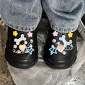 Unisex children's summer sandals with colorful pattern, slip-on clog design, suitable for garden, bathroom, and casual wear.
