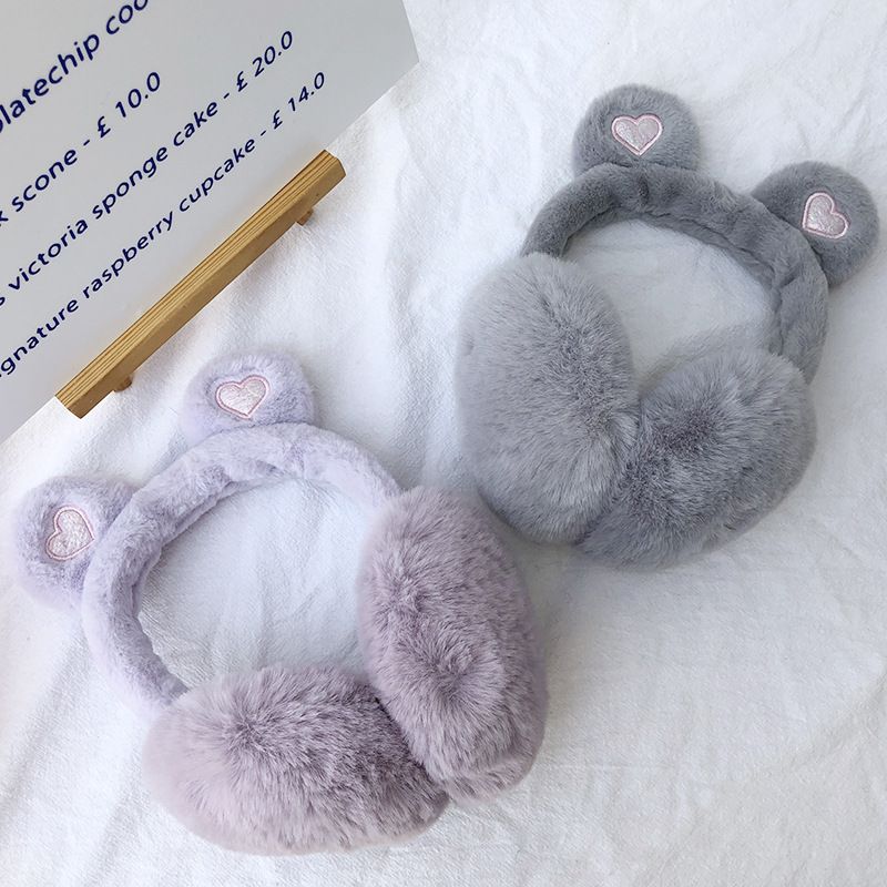 Pair of fluffy plush foldable winter ear muffs for women and kids, warm ear warmers for cold weather by Everything Baby.