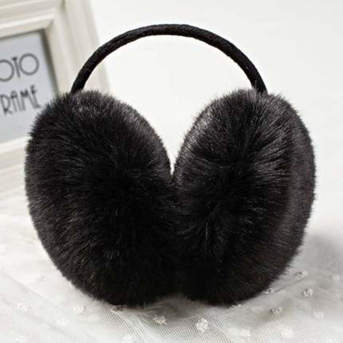 Black women's winter earmuffs with fleece lining, adjustable ski ear covers, perfect for outdoor warmth and cute winter style.