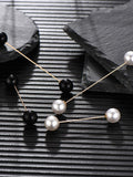 Four pearl brooch pins for women's sweaters and shirts, vintage style sweater clips with double faux pearl accents.