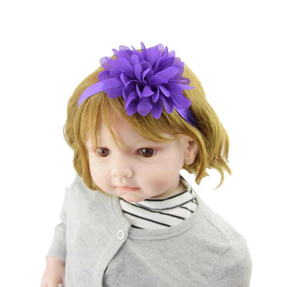 Pair of stretchy nylon flower headbands for babies and toddlers, soft elastic hair accessories for newborns and young children.
