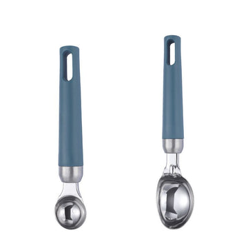 Two ergonomic gourmet ice cream scoops with washable handles, ideal for serving ice cream and desserts easily.