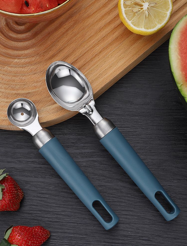 Two gourmet ice cream scoops with ergonomic handles, dishwasher safe, designed for easy serving of ice cream and desserts.