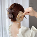 Set of three cute mesh tulle bow claw clips for girls by Everything Baby, featuring shark and crab designs for toddler hair accessories.