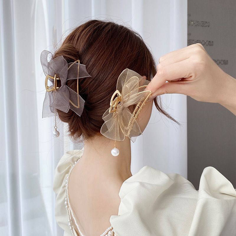 Set of three cute mesh tulle bow claw clips for girls by Everything Baby, featuring shark and crab designs for toddler hair accessories.