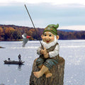 Outdoor garden fishing gnome statue by Everything Baby, seated with a fishing rod, perfect for garden decoration.