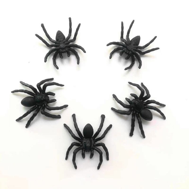 Six small black plastic spiders, realistic and fun, perfect for Halloween prank decorations or kids' toy play.