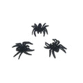 Six small black plastic fake spiders with realistic details, ideal for Halloween decorations and prank fun.