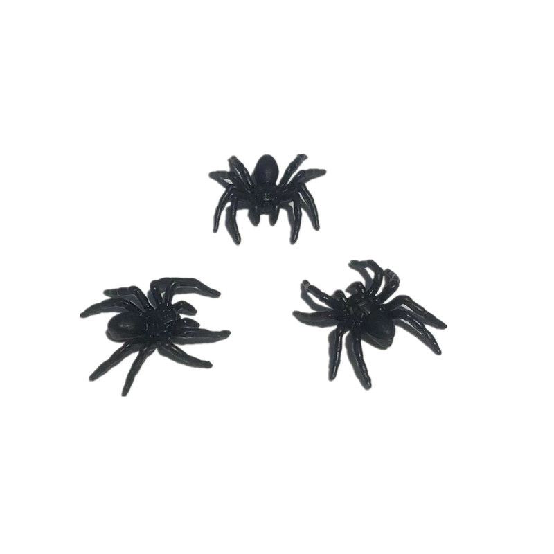 Six small black plastic fake spiders with realistic details, ideal for Halloween decorations and prank fun.