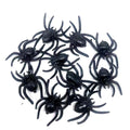 Set of 10 realistic black plastic fake spiders for Halloween decoration and pretend play in kids' toy and spooky prop collection