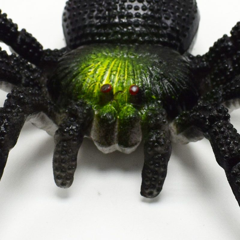 Three large fake simulation spiders for Halloween prank decorations, suitable for kids' spooky party setups.