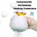 Yellow duck baby bath toy from Everything Baby, hatching egg water toy for toddlers in a bathtub or pool setting.