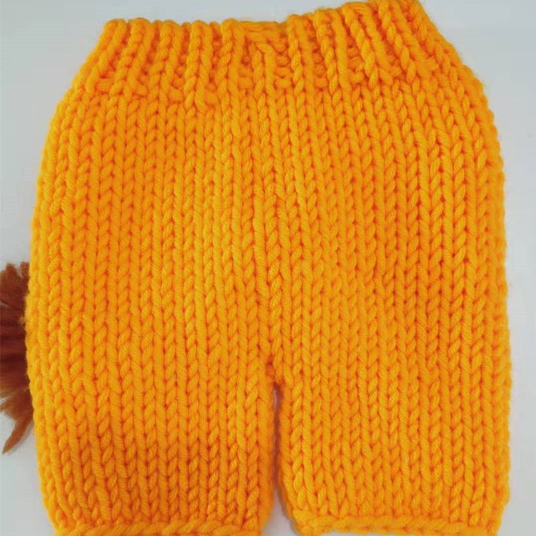Handmade crochet newborn baby outfits in soft colors, perfect for infant photo shoots, by Everything Baby.
