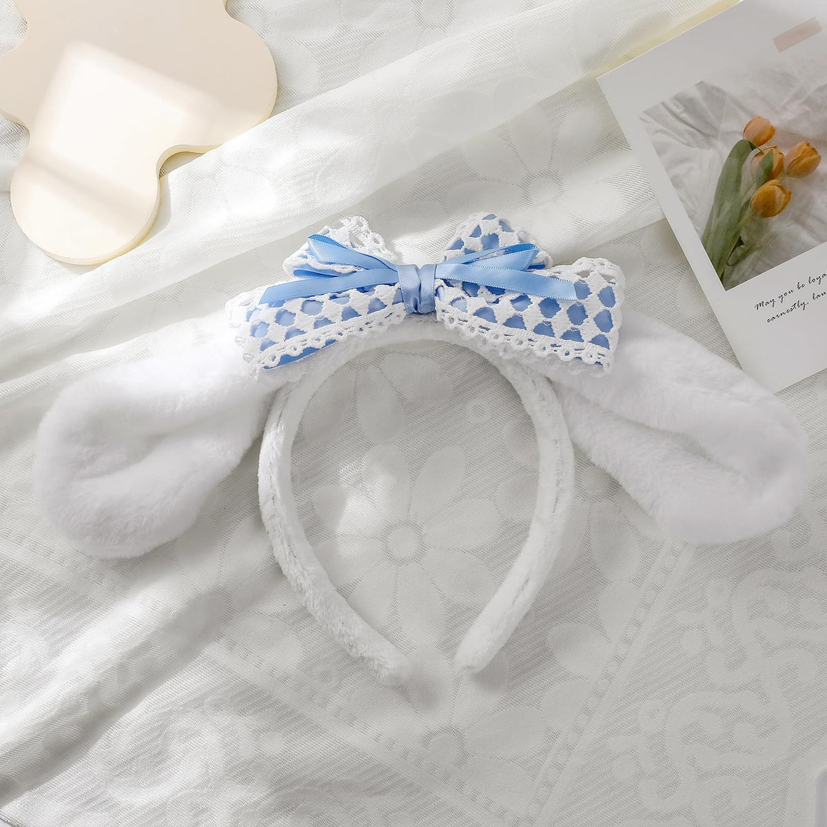 Furry bunny ears headband with bowknot, cute rabbit and puppy ears, ideal for kids' costumes or playful facial makeup looks.