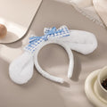 Furry bunny ears headband with bowknot for girls, perfect for costumes, facial makeup, or playful dress-up accessories.