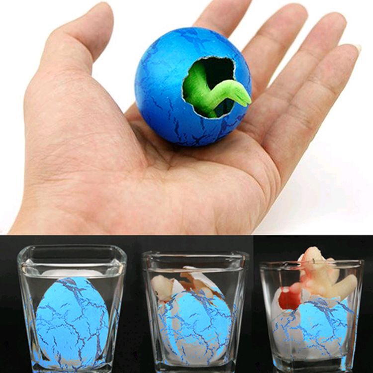 60-piece Hatch and Grow Dinosaur Eggs set by Everything Baby, large hatching dinosaur eggs for kids' outdoor play and discovery.