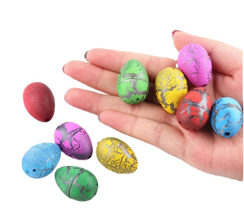Set of 60 hatch and grow dinosaur eggs toy for kids, featuring large size cracking eggs for outdoor play and dinosaur hatching fun.