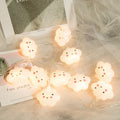Cute cloud-shaped baby night light with a smiling face, warm white glow, ideal for nursery decor and cozy room lighting.