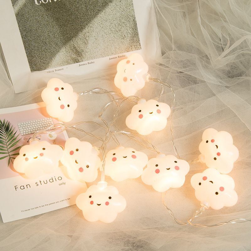 Cute cloud-shaped baby night light with a smiling face, warm white glow, ideal for nursery decor and cozy room lighting.