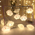 Cute cloud-shaped baby night light with face, warm white glow, ideal for bedroom decor and holiday festive ambiance.