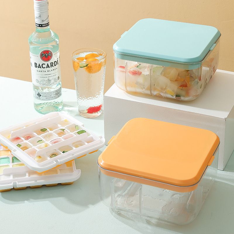 Double-layer ice cube mold with ice spoon from Everything Baby, showing two trays and a scoop for making ice at home.