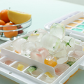 Two double-layer ice cube molds with ice spoons from Everything Baby, ideal for making fun ice cubes in the kitchen.