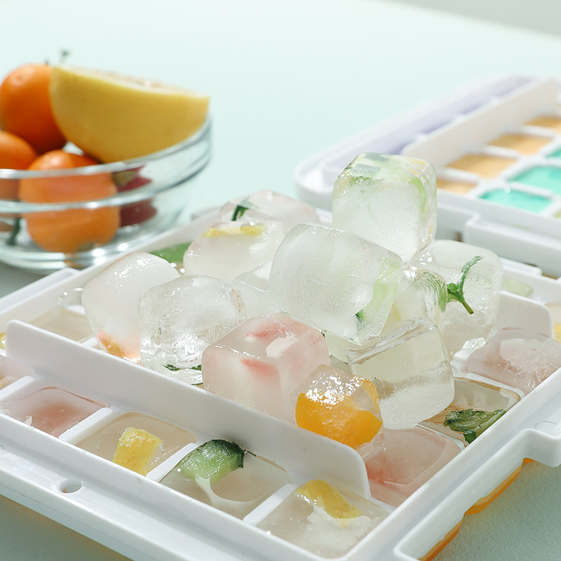 Two double-layer ice cube molds with ice spoons from Everything Baby, ideal for making fun ice cubes in the kitchen.