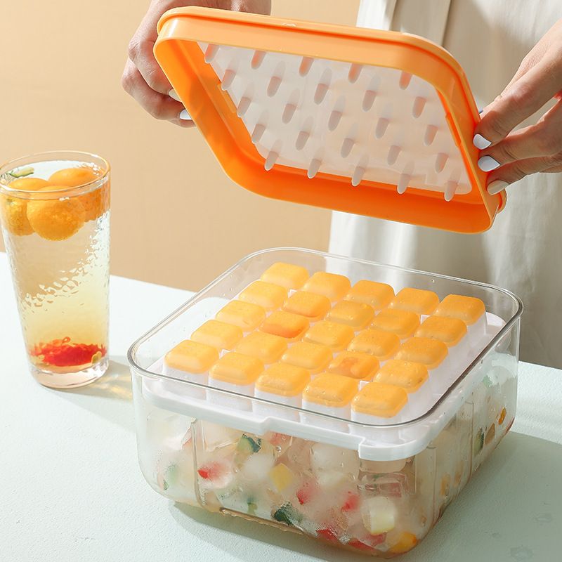 Double-layer ice cube mold with ice spoon from Everything Baby, perfect for making fun ice cubes in the kitchen.