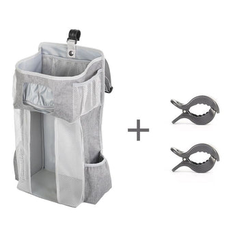 Everything Baby hanging diaper organizer with multiple compartments for baby diapers and essentials on a nursery changing table