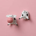 Set of three cute cow butt resin refrigerator magnets with funny, decorative design, ideal for kids' toy collection or fridge decor.