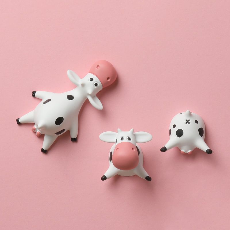 Three cute cow butt resin refrigerator magnets with playful design, suitable for decorating and sticking on metal surfaces.
