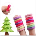 Set of 300 multicolor baby hair ties for toddlers and kids, soft cotton seamless elastic hair bands for ponytails and hair accessories.