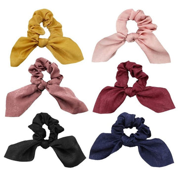 Six satin silk hair scrunchies with bowknot design in neutral colors, elastic ponytail holders for women and kids.