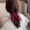 Six neutral satin silk hair scrunchies with bowknot design, elastic ponytail holders for women and girls.
