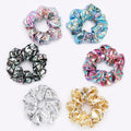 Six large gold metallic lame leaf hair scrunchies for girls, shiny elastic ponytail holders for dance, gym, or show occasions.