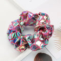 Six large gold metallic lame leaf hair scrunchies for girls, shiny elastic ponytail holders, perfect for dance, gym, or parties.