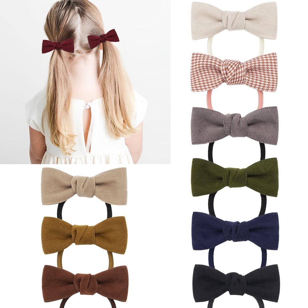 20-pack of colorful bow hair ties for girls, toddler hair accessories with elastic ponytail holders and pigtail bows.
