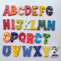 Magnetic wooden alphabet refrigerator stickers with 26 letters, strong adhesion, ideal for kitchen decor, whiteboards, and educational play.