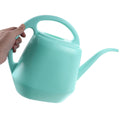 Blue plastic indoor watering pot with ergonomic design, sturdy and practical, suitable for kids' outdoor play and gardening activities.