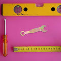 Multi-color iron pocket door hardware wrench for home use, suitable for various door types, by Everything Baby.
