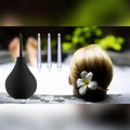 Silicone 8oz anal and vaginal douche bulb with four replaceable tips, designed for personal cleansing and health use.