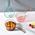 Grey ergonomic water ladle and large soup scoop for kids, made of durable PP plastic, designed for easy serving.