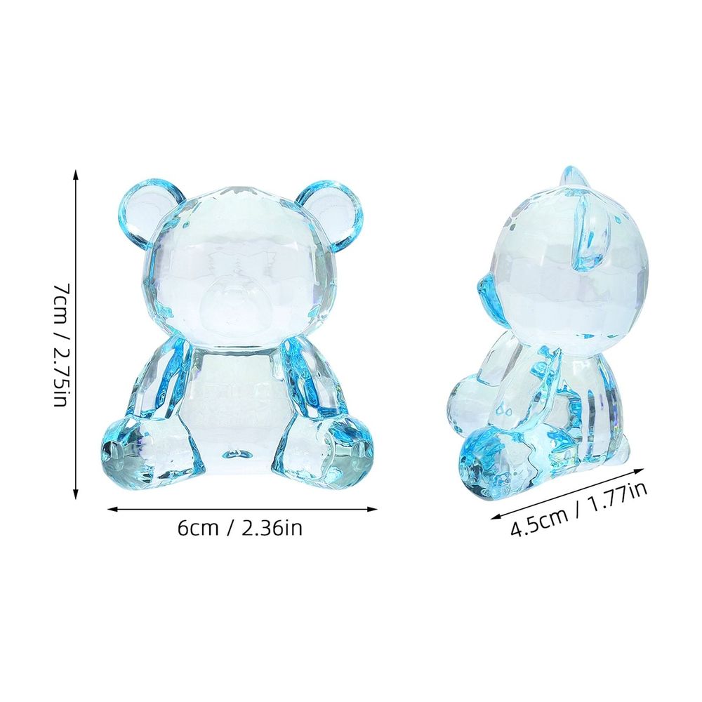 Blue acrylic tiny bear statue ornament, decorative collectible for home decor, from Everything Baby, suitable for nursery or children's space.