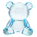 Blue acrylic tiny bear statue ornament for home decor, collectible baby and kids nursing-themed decorative figure.