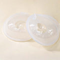 Two leakproof silicone breastfeeding collector shells from Everything Baby, designed for comfortable, convenient use by nursing moms.